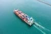 Aerial Top View Of Cargo Ship Carrying Container For Import Expo