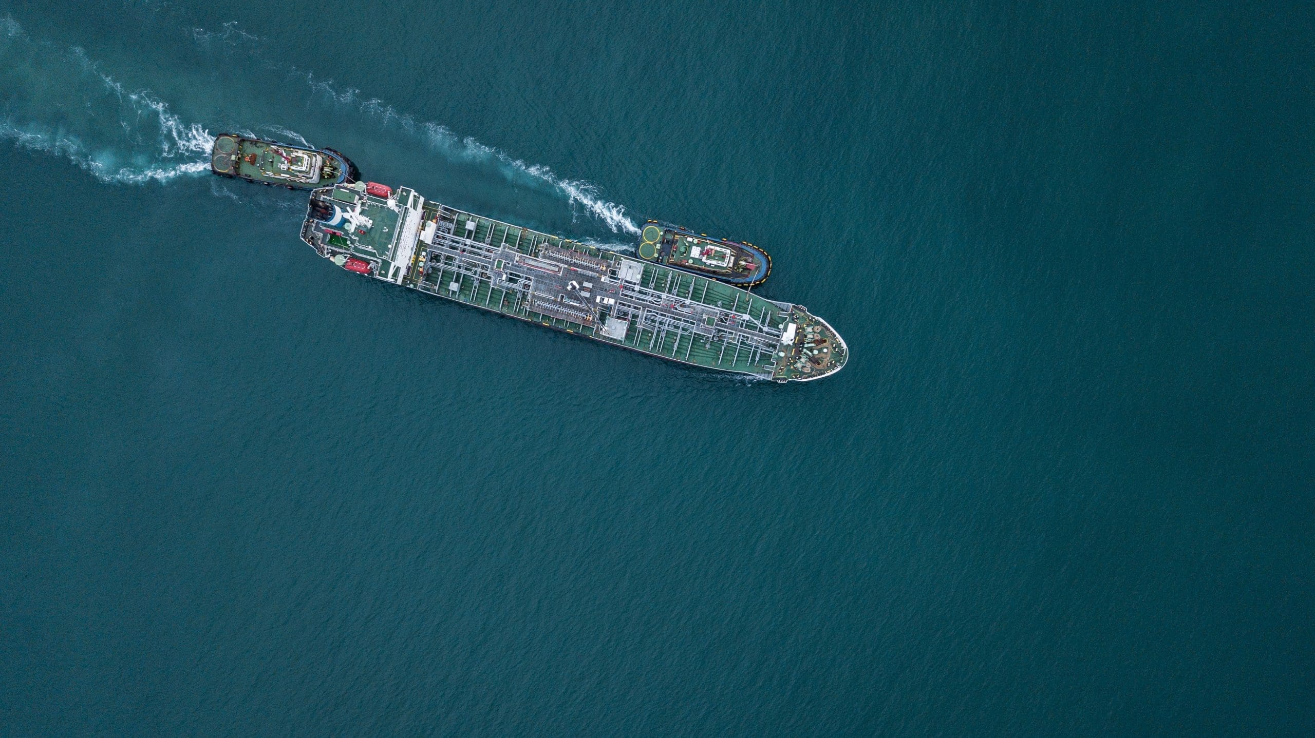 Aerial View Tanker Ship Vessel Unloading At Port, Global Busines