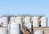 Industrial Building With Goup Of Metal Storage Tanks