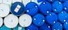 Old Chemical Barrels. Blue And Green Oil Drum. Steel And Plastic