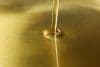 Pouring Olive Oil Texture Background, Close Up And Space For Tex