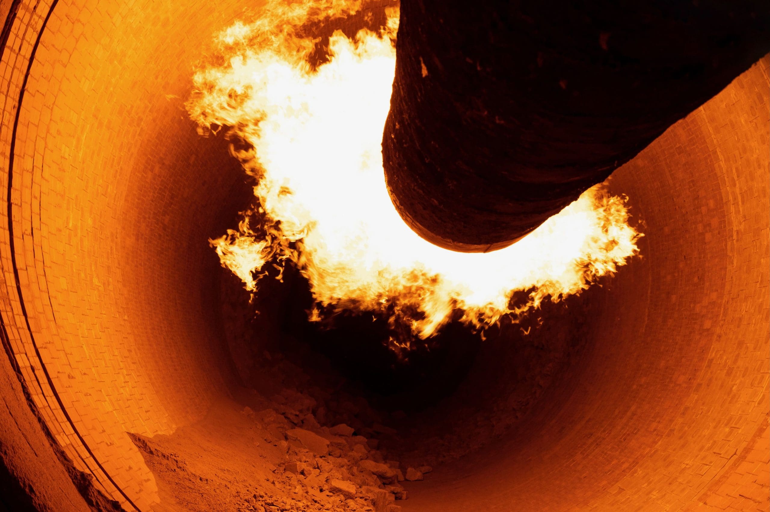 Close Up Of Flame In Rotary Kiln During Heating Mode In Cement Plant